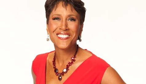 Robin Roberts of Good Morning America smiling in a red dress