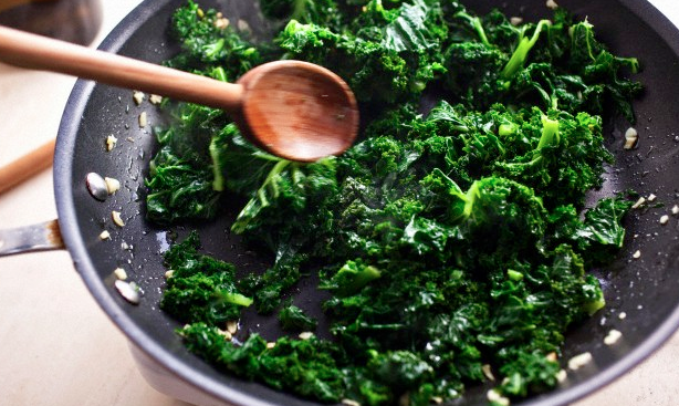 A skillet filled with kale