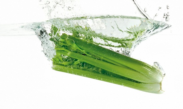 A bunch of celery in water