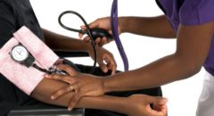 black person getting blood pressure checked