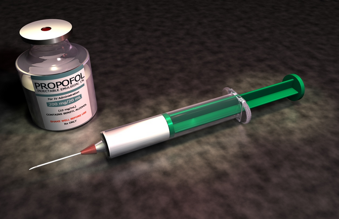 A propofol vial and a needle