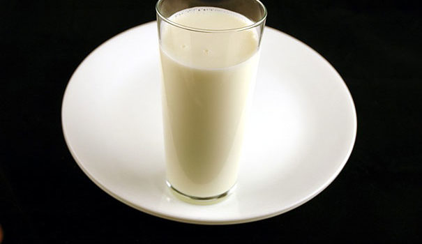glass of milk on a saucer