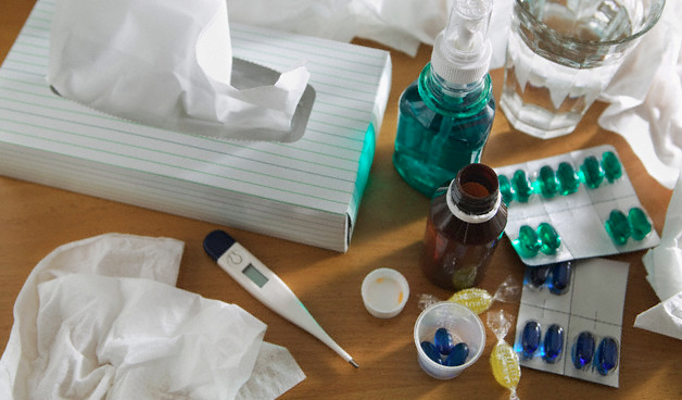cold medication tissues and thermometer