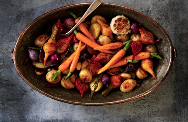 A pot filled with roasted vegetables