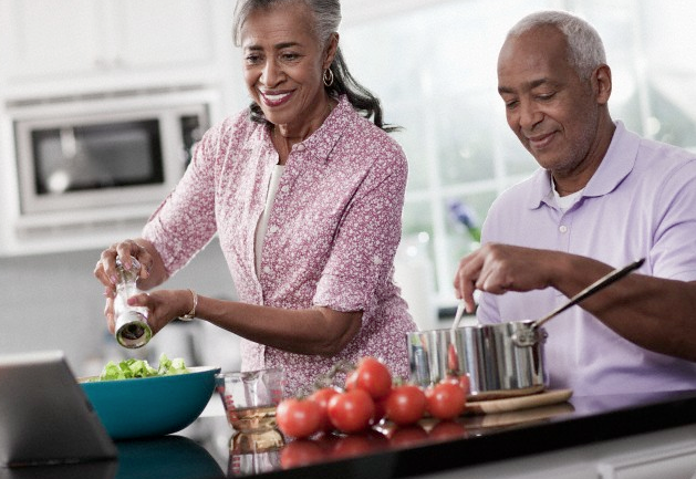 A couple cooking in their kitchen