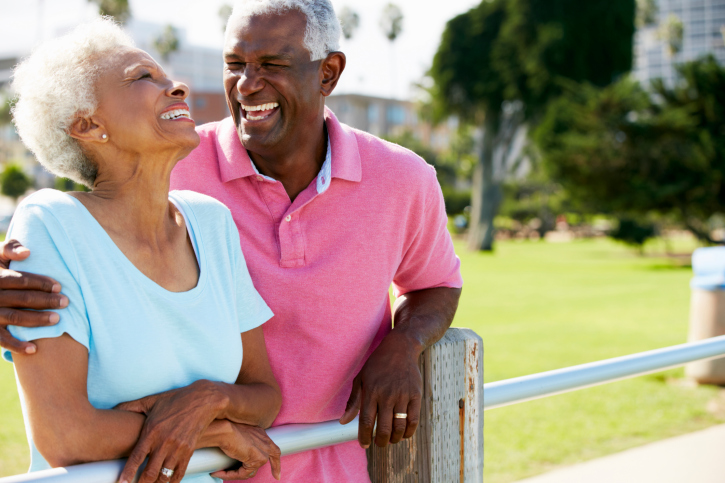 elderly couple laughing