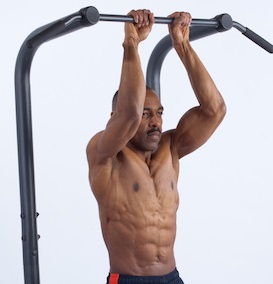 african american man doing closed hand pull up