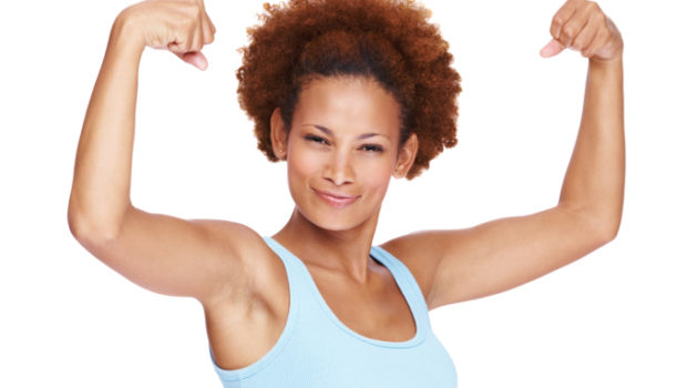 african american woman flexing her arm muscles