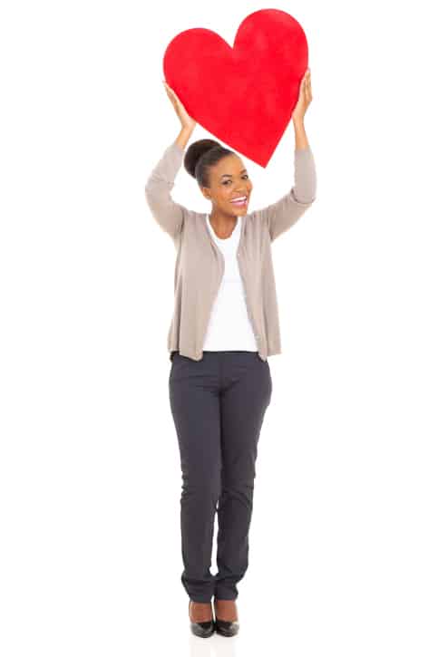 woman holding heart full length