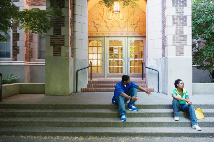 couple arguing on steps