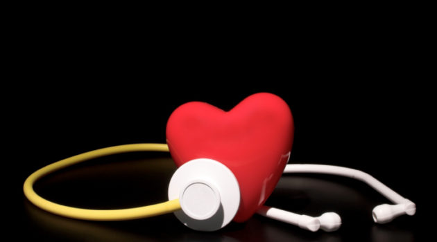 A red heart shape and a medical stethoscope.