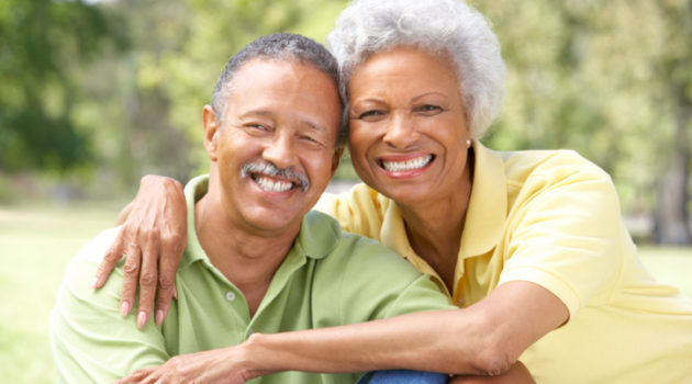 senior couple outdoors smiling
