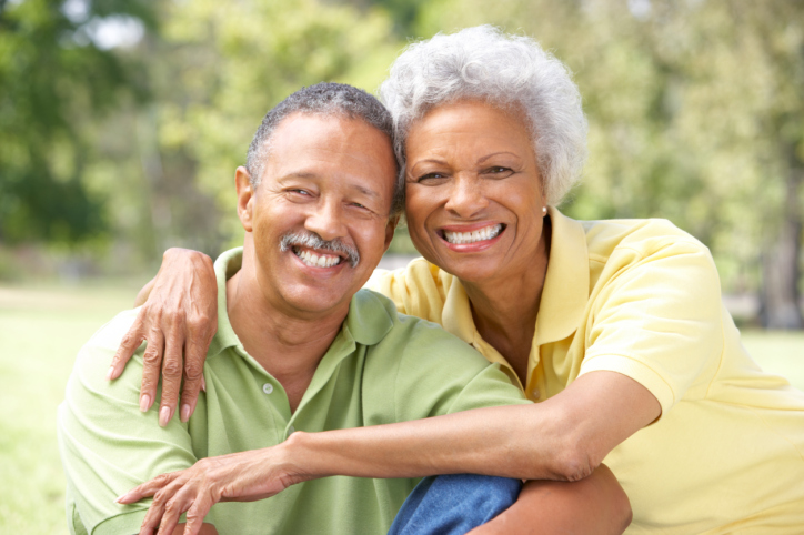 senior couple outdoors smiling