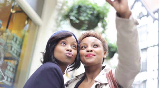 two african american women posing for a picture