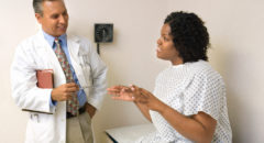 woman talking to doctor