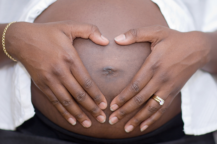close up of pregnant womans belly