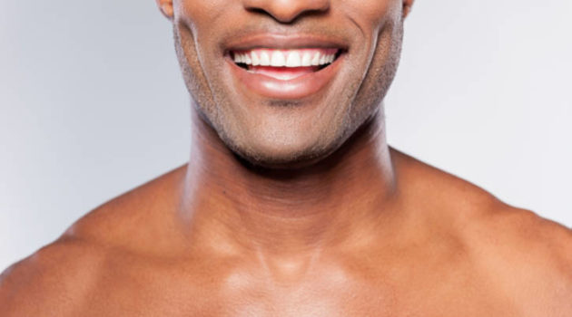 African American man smiling with white teeth