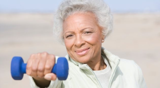 senior woman with dumbbell