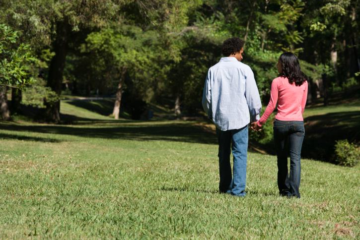 couple walking in park