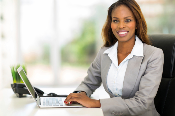 businesswoman on laptop in office