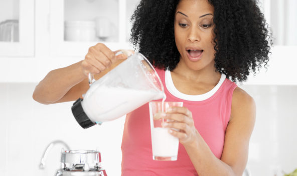 woman making smoothie milkshake