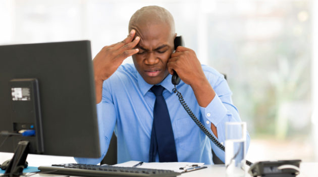 stressed businessman on phone