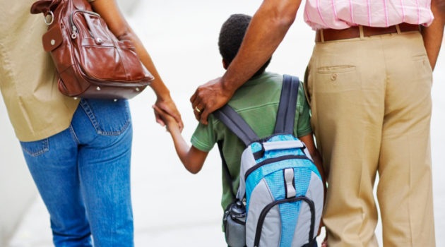Parents Walking Son to School