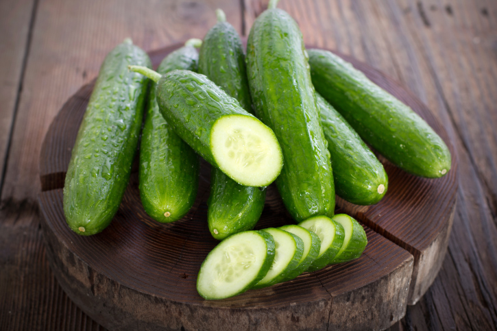 cucumbers on wooden table