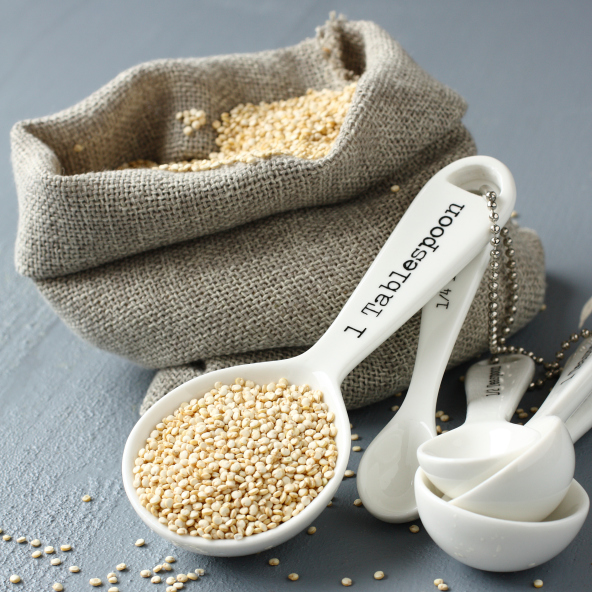 quinoa in measuring spoon