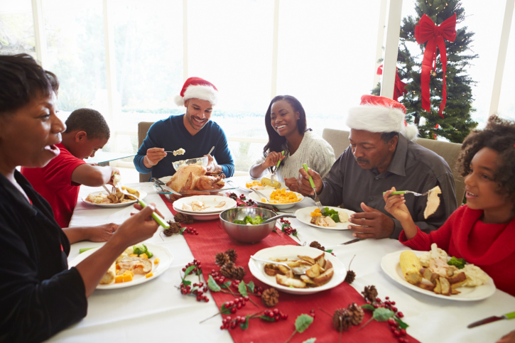 African American Black family eating Christmas dinner