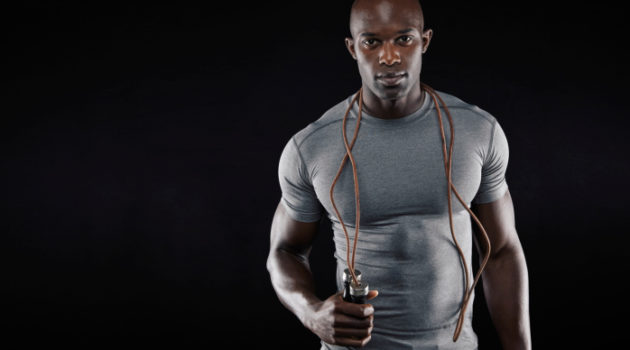 African American Black muscular man with jumping rope
