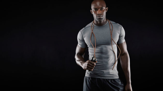 muscular African American man with jump rope