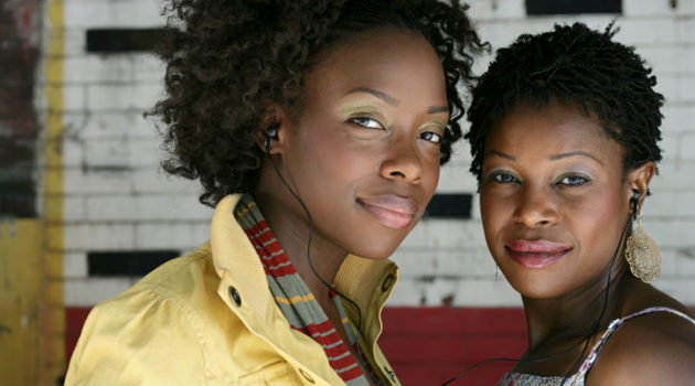 Two African American Women friends smiling