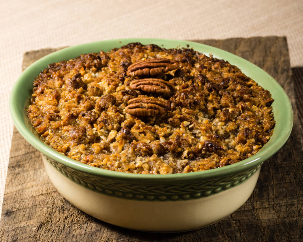 Baked sweet potato casserole with pecan topping