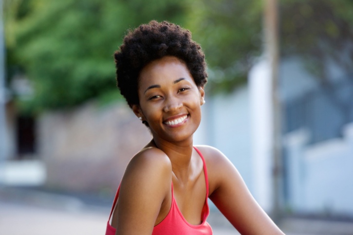African American young woman happy outside