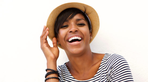 Happy African American woman wearing hat