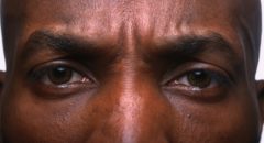 close up African American man's eyes