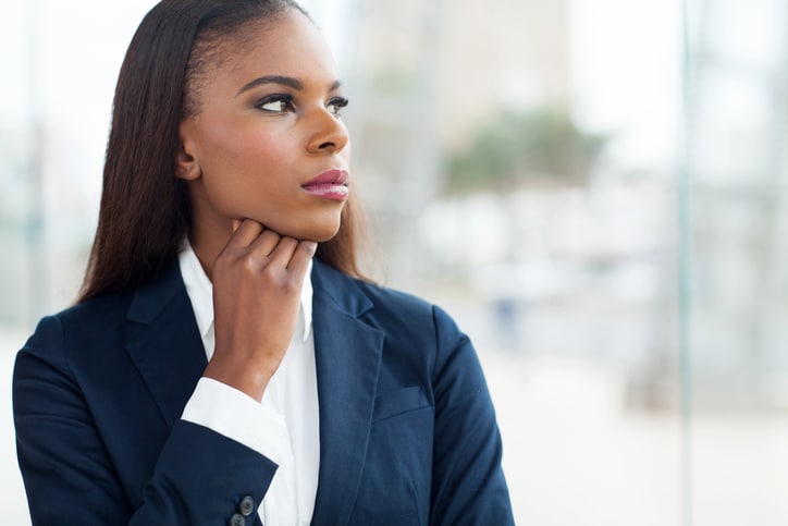 African American businesswoman looking thoughtful