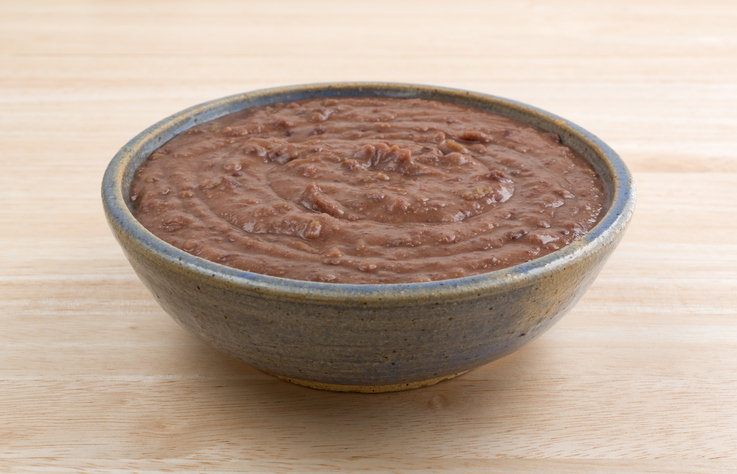 Black bean dip in a bowl on a wood table