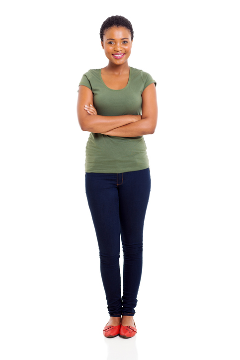 happy young afro american woman with arms folded