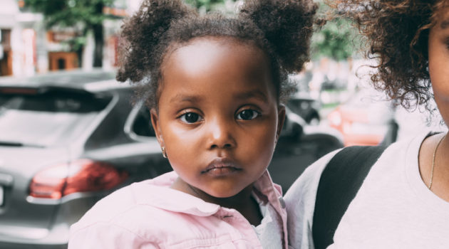 African American baby toddler girl unhappy