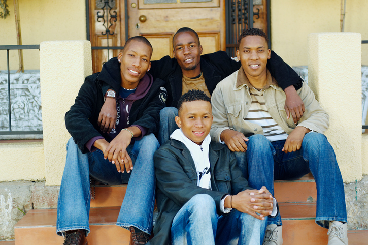 African American man with group of boys