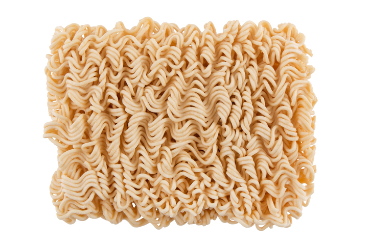 Ramen Noodles in a white Bowl. Isolated on white