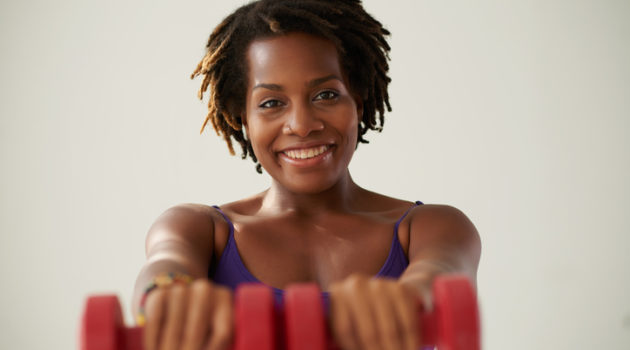 African American woman exercise dumbbells