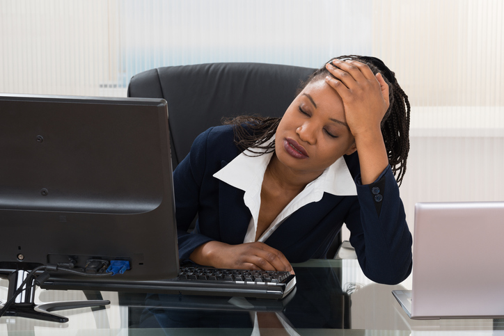 African American woman stressed at work