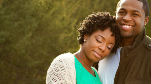 Happy African American couple outside