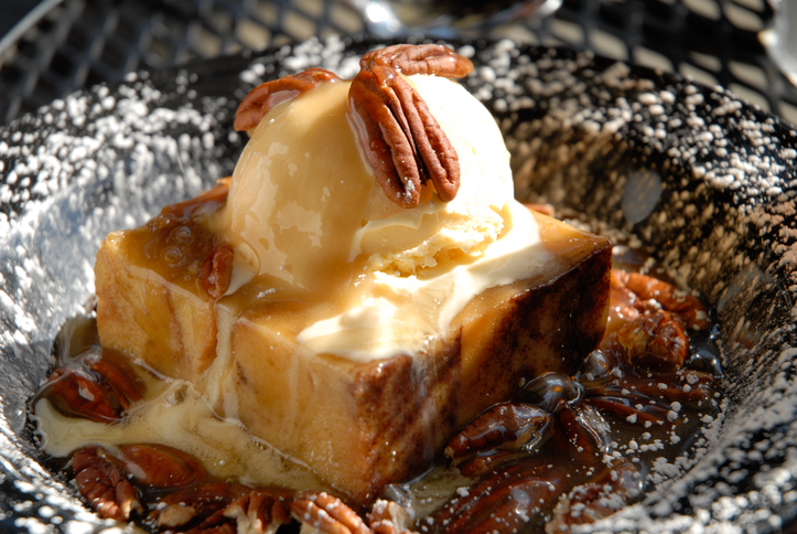 Bread Pudding with Ice Cream, Pecans and Powdered Sugar