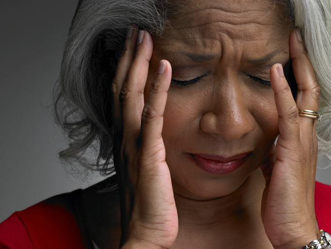 Senior African American woman with headache