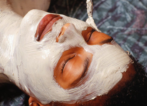 African American woman clay mask