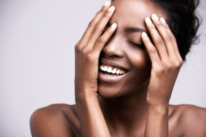 African American woman happy clear skin